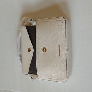 NWT. Michael Kors Maisie medium 3 in 1 crossbody bag.